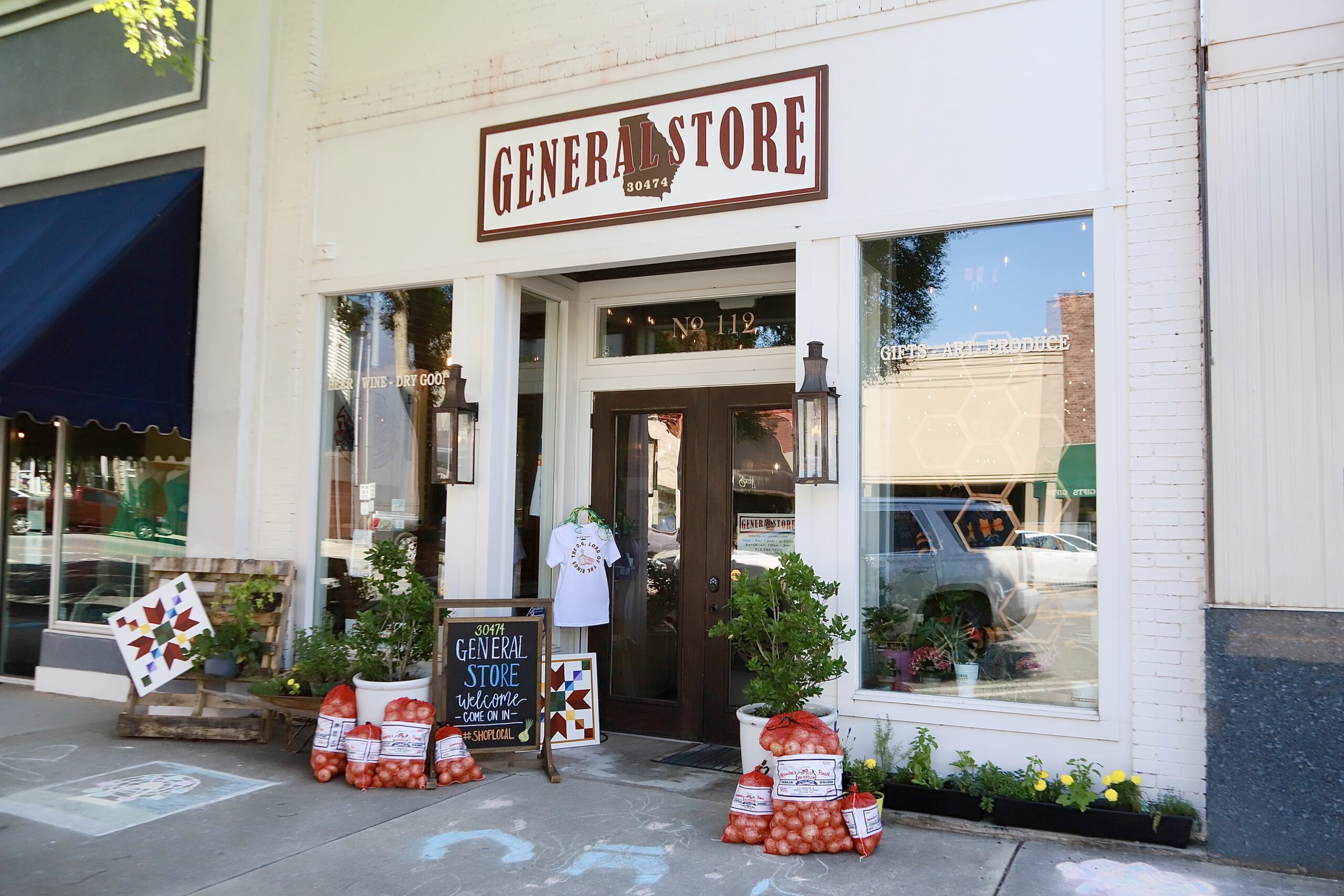 Local small business storefront in a historic downtown district representing the community-focused businesses served by Z2A Marketing Solutions.
